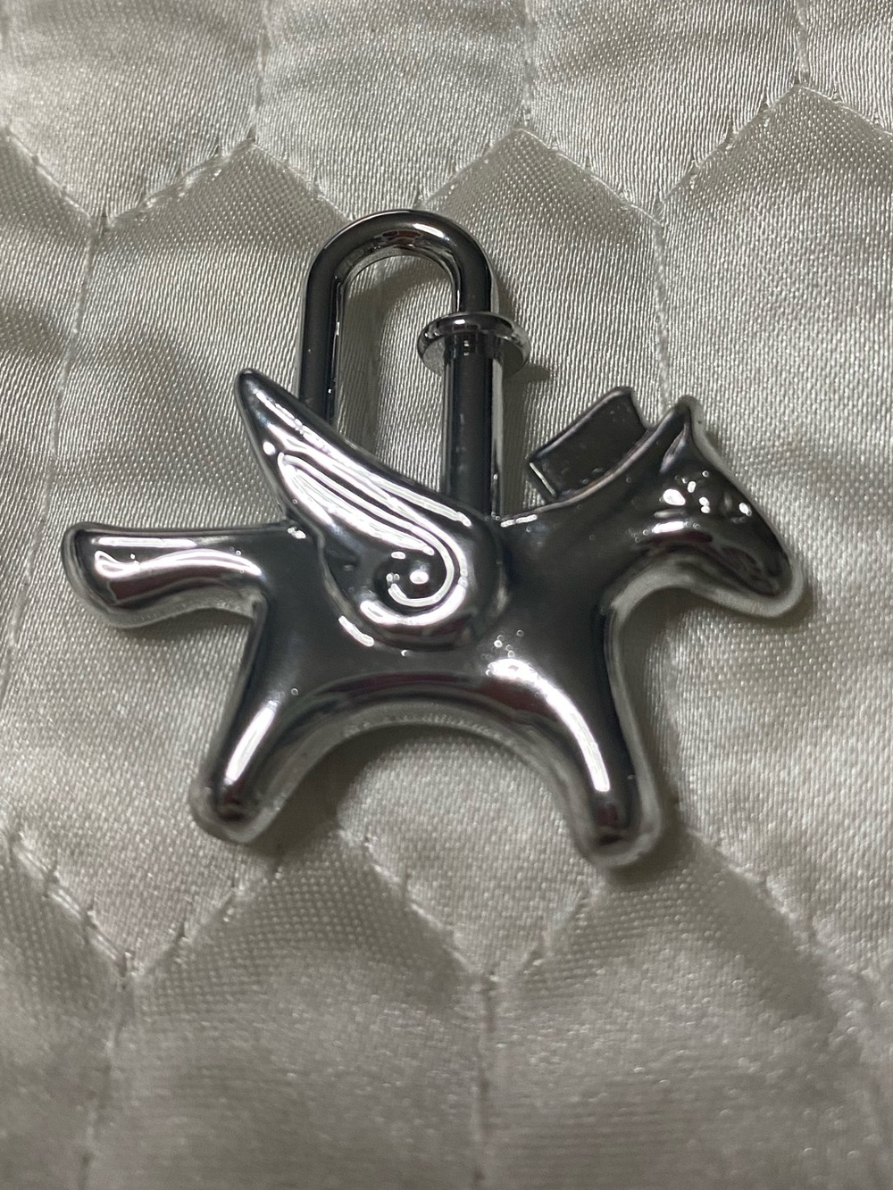 Cadena Silver tone Pegasus horse motif bag charm lock